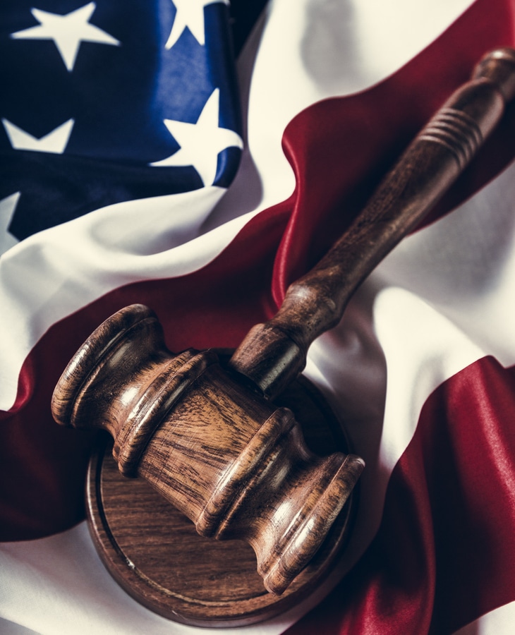 Wooden gavel and USA flag